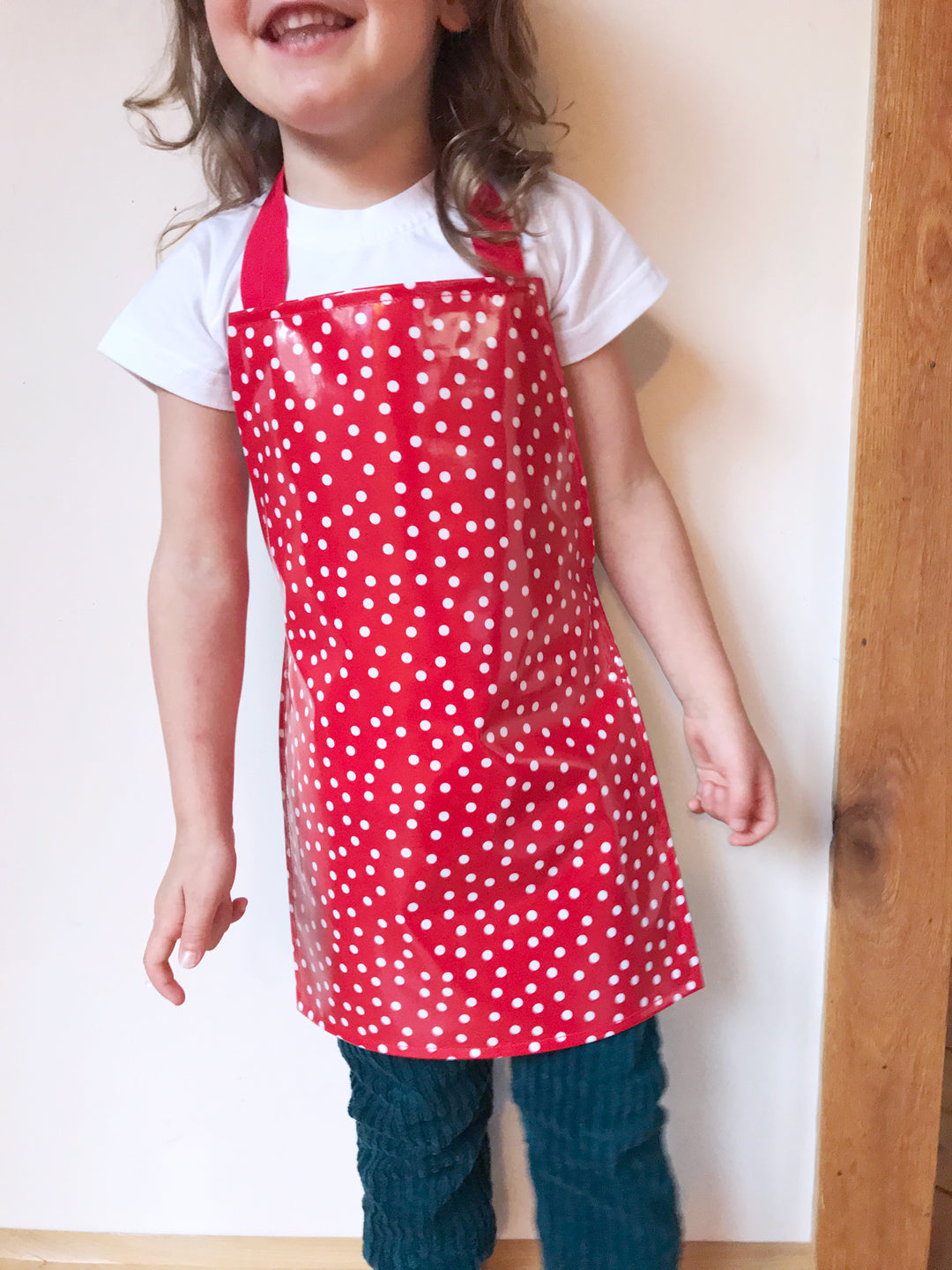 Red Slicker Aprons - Maitri Learning